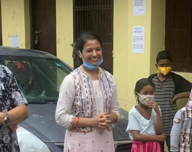 Meena with husband at hospital